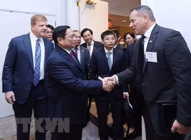 越南政府总理范明政与美国企业界代表会面 ảnh 2
