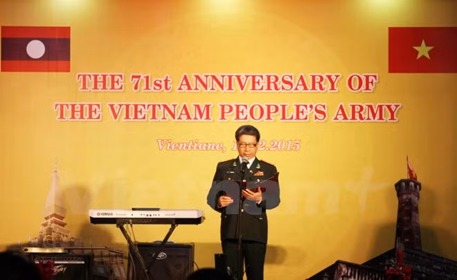 越南人民军建军71周年纪念典礼在老挝举行 ảnh 1 越南人民军建军71周年纪念典礼在老挝举行 ảnh 1