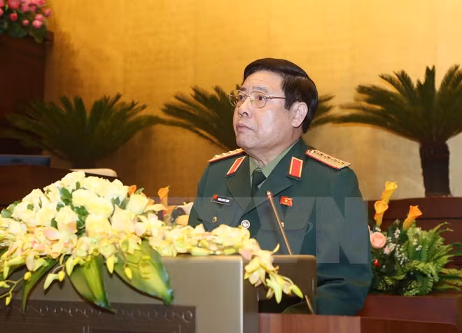 越南高级军事代表团对老挝进行正式友好访问 ảnh 1