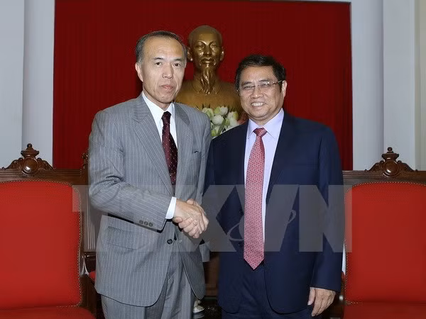 越共中央组织部部长范明正会见日本高级专家代表团 ảnh 1