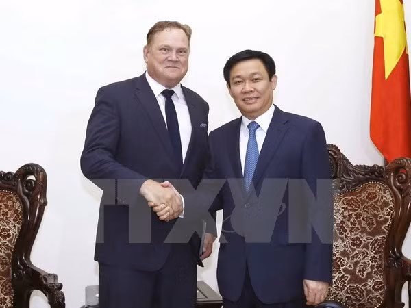越南政府副总理王廷惠会见加拿大企业代表团 ảnh 1 越南政府副总理王廷惠会见加拿大企业代表团 ảnh 1