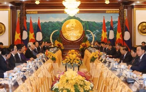 越老联合声明：两国永远在民族独立和社会主义道路上携手前行 ảnh 1