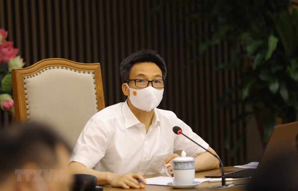 各工业园区和工厂工作人员必须进行健康申报 ảnh 1