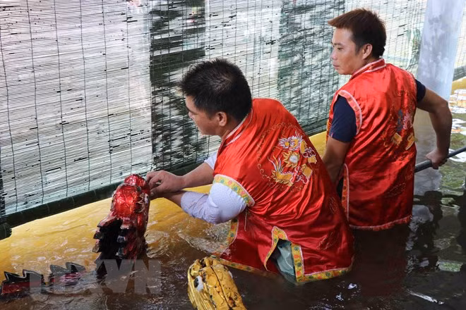 河内市保护与弘扬陶淑水上木偶戏的文化价值 ảnh 2 河内市保护与弘扬陶淑水上木偶戏的文化价值 ảnh 2