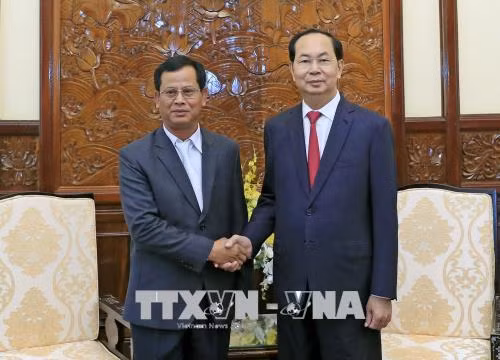 越南国家主席陈大光会见老挝公安部副部长 ảnh 1