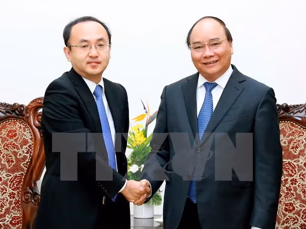 阮春福总理：希望日本努力争取早日成为越南最大的投资来源国 ảnh 1