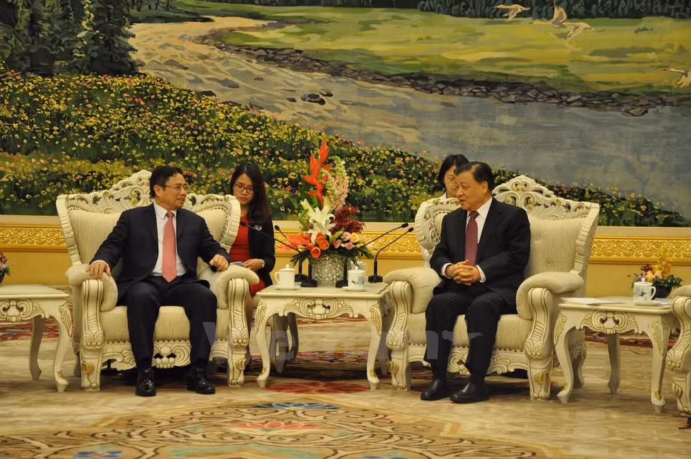 中国共产党领导会见越共中央组织部部长范明正 ảnh 1
