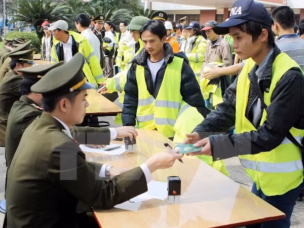 “协助越南劳动者出国劳务”研讨会在河内举办 ảnh 1