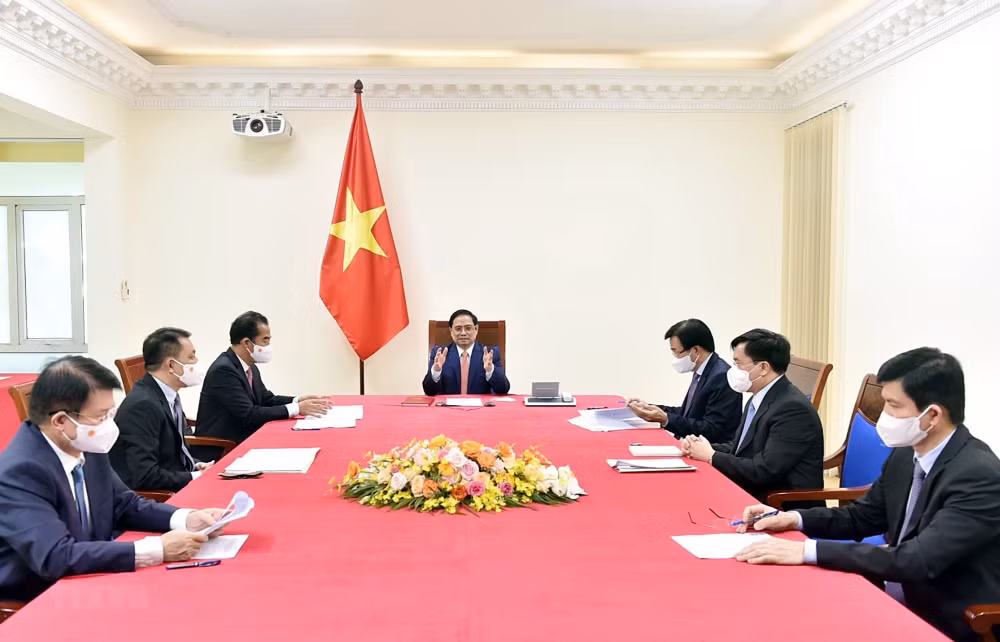 越南政府总理范明政与德国总理默克尔通电话 ảnh 1 越南政府总理范明政与德国总理默克尔通电话 ảnh 1
