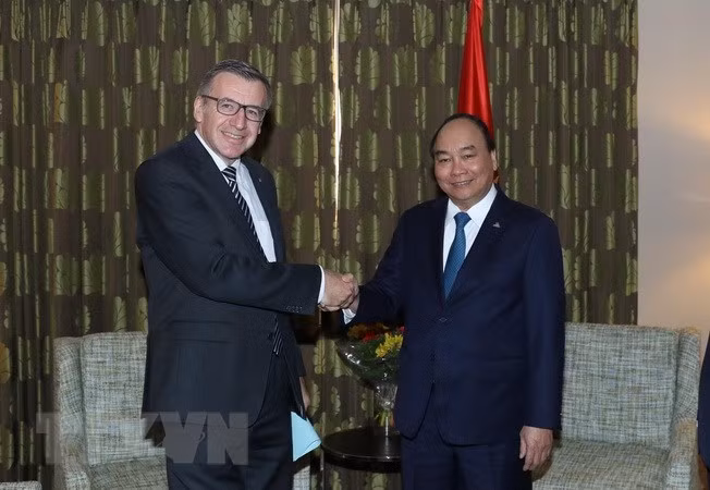 越南政府总理阮春福会见原比利时外交大臣 ảnh 1 越南政府总理阮春福会见原比利时外交大臣 ảnh 1