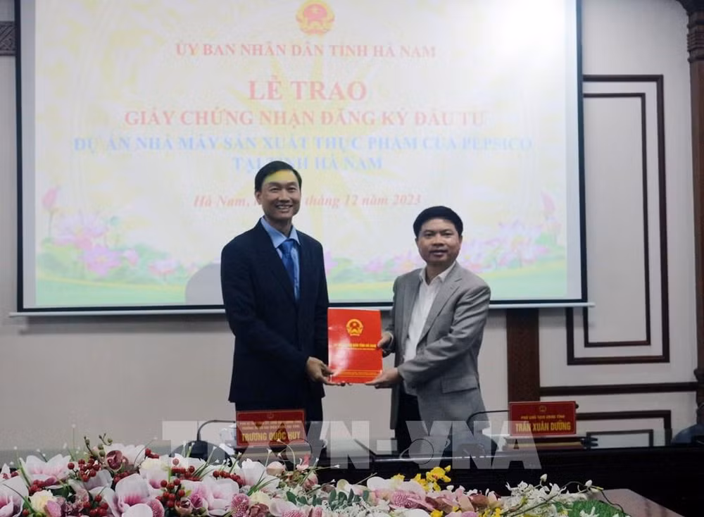 河南省向百事（越南）食品有限公司颁发投资许可证 ảnh 1