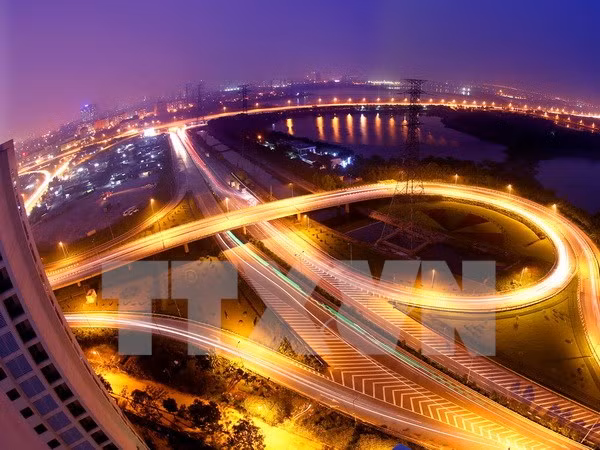 越共十二大：国际舆论高度评价越南经济前景 ảnh 2