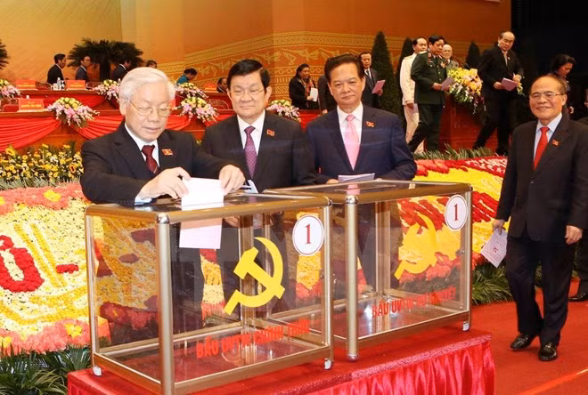 越共十二大：代表们相信新一届中央委员会将引领国家继续向前迈进 ảnh 1
