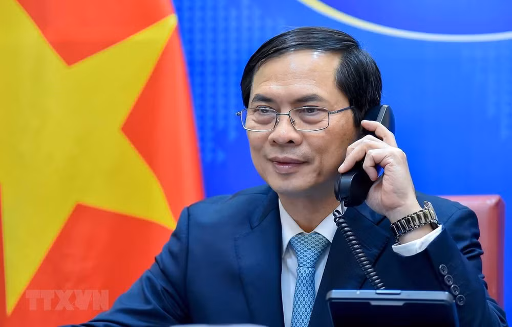 越摩两国外长就双边合作与多边场合配合交换意见 ảnh 1