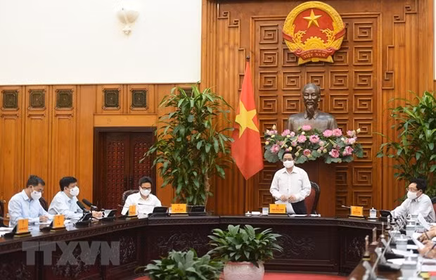 政府总理范明政:增强个人和集体的防疫意识 ảnh 2 政府总理范明政:增强个人和集体的防疫意识 ảnh 2