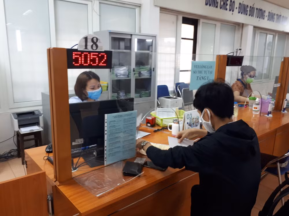 从失业保险基金会拔出近8450亿越盾援助受疫情影响的劳动者和雇主 ảnh 1