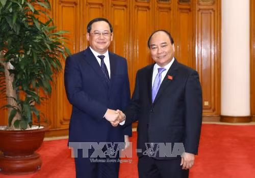 越南政府总理阮春福会见老挝政府副总理宋赛•西潘敦 ảnh 1