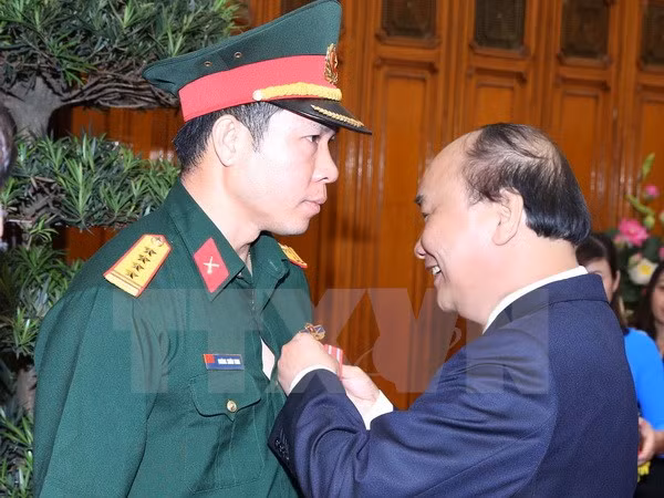 越南射击选手黄春荣荣获一级劳动勋章 ảnh 1