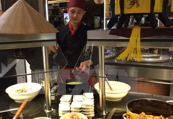 越南旅游摄影图片展及饮食文化周在哥伦比亚举行 ảnh 1