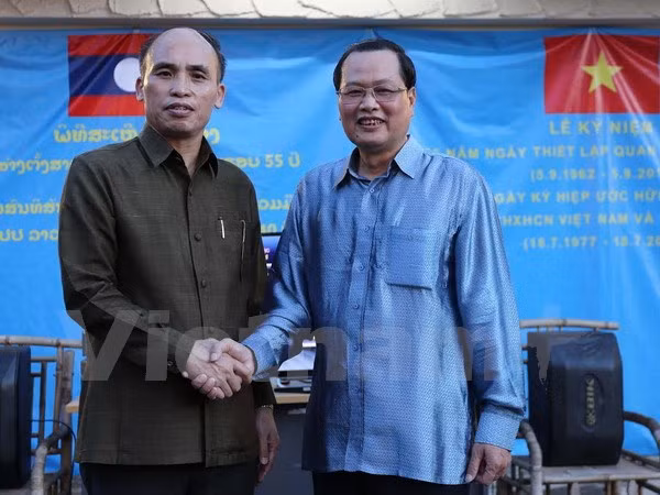 纪念越老建交55周年交流会在新加坡举行 ảnh 1