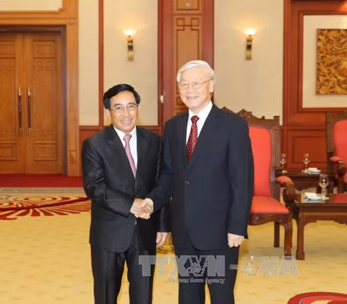 越南党和国家领导人分别会见老挝国家副主席潘坎•维帕万 ảnh 2
