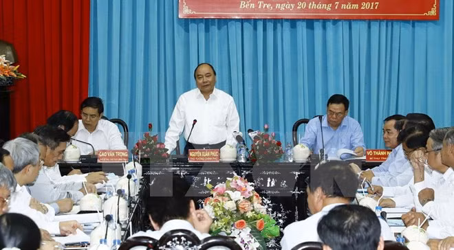 阮春福总理：集中资源 协助槟椥省有效应对气候变化 ảnh 1