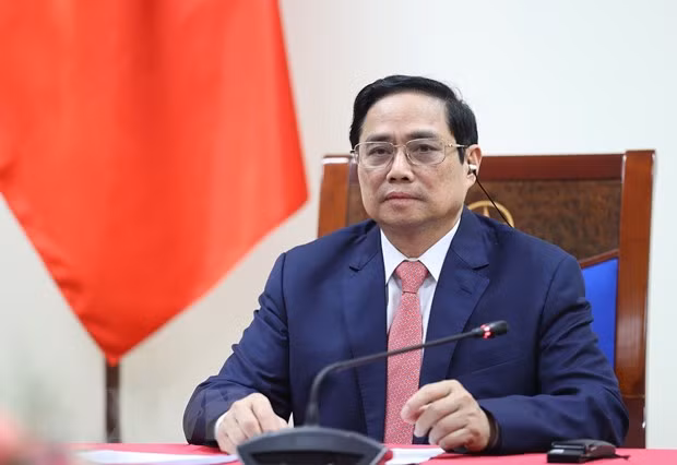 政府总理范明政与荷兰首相马克通电话 ảnh 1
