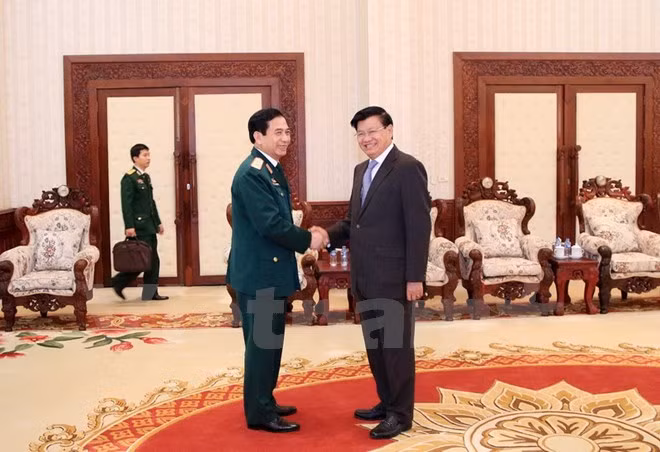 越南与老挝加强防务合作 ảnh 1