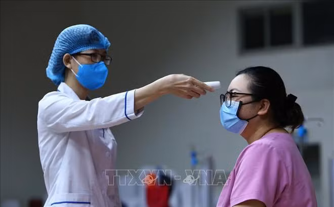 越南“不让任何人掉队”的防疫模式 ảnh 1