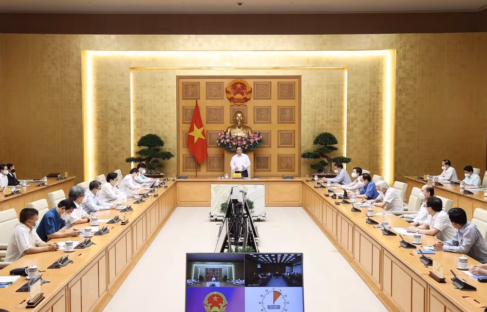 政府总理范明政：科学家和医务人员是防疫工作的重要支柱 ảnh 2