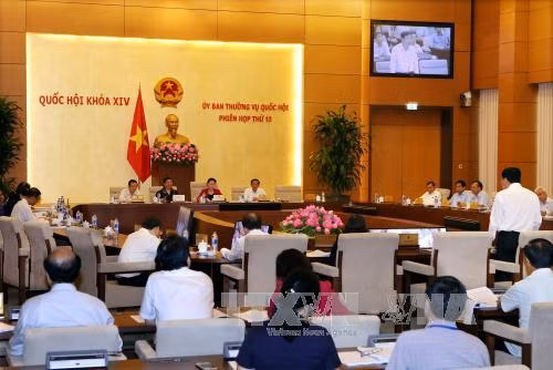 越南第十四届国会常委会第十三次会议讨论《渔业法》和《森林保护与发展法》两项法案 ảnh 1