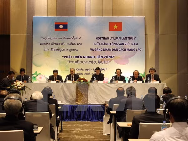 越南共产党和老挝人民革命党第五次理论研讨会拉下帷幕 ảnh 1