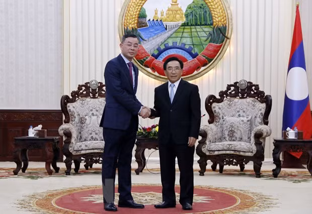 老挝总理和国会常务副主席会见越南国家审计署代表团 ảnh 2