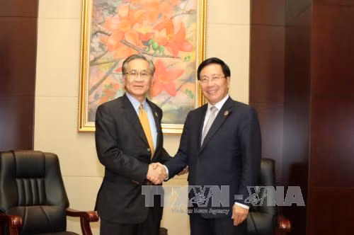 越南政府副总理兼外交部长范平明分别会见各国外长 ảnh 1