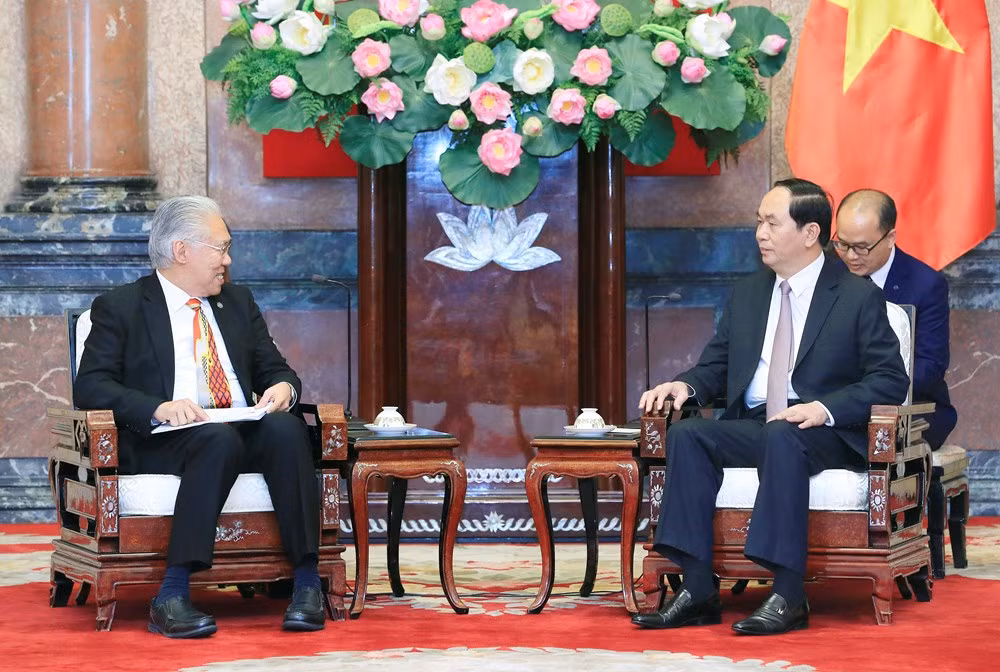 越南国家主席陈大光会见加拿大和印尼客人 ảnh 3