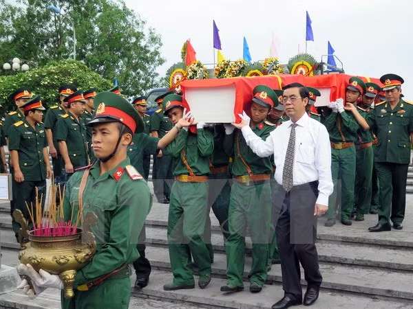 越南志愿军烈士遗骸归国安葬仪式在全国各地举行 ảnh 1 越南志愿军烈士遗骸归国安葬仪式在全国各地举行 ảnh 1