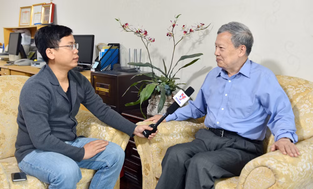 国家主席陈大光访华：越通社记者专访新华社世界问题研究中心研究员凌德权 ảnh 2