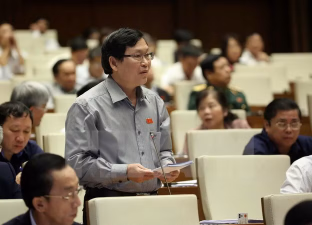 农业与农村发展部和工商部两部部长回答代表的质询 ảnh 1