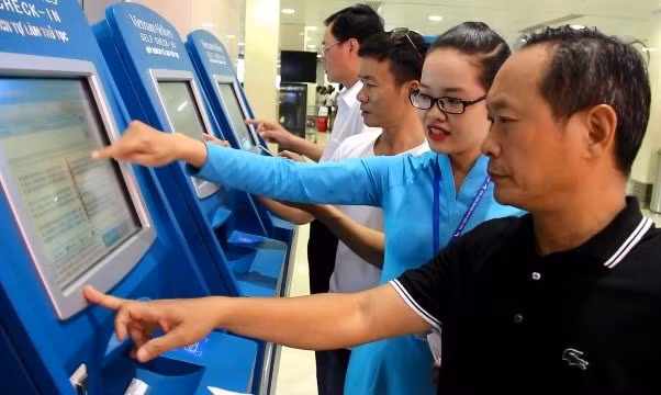 越航在许多国家机场设置自动值机柜台 ảnh 1