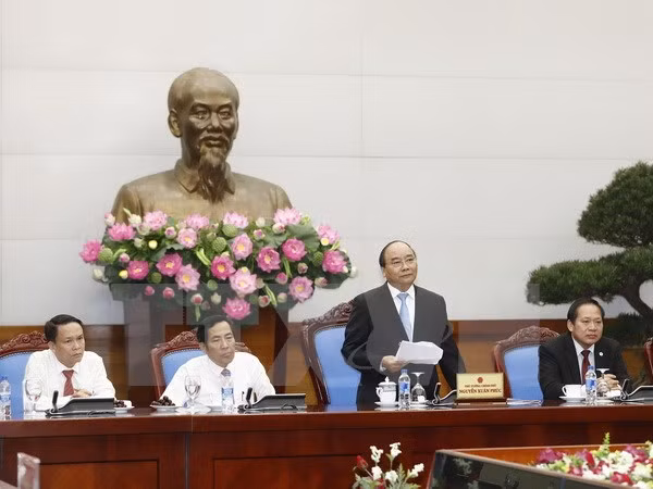 阮春福总理：加大新闻宣传力度 进一步改善经营环境 ảnh 1
