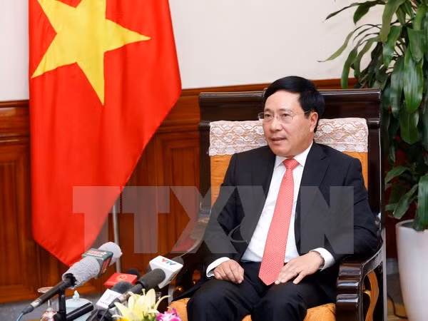 政府副总理兼外长范平明：越柬两国全面友好合作关系不断发展 造福两国人民 ảnh 1
