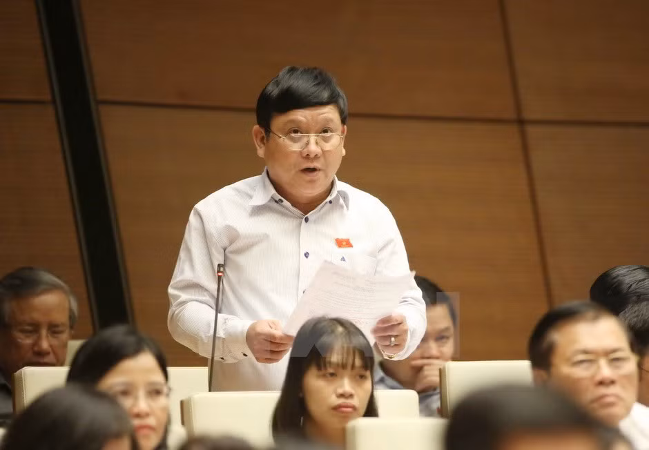 越南第十四届国会第三次会议：不把处置不良贷款的一切责任都算到银行头上 ảnh 1