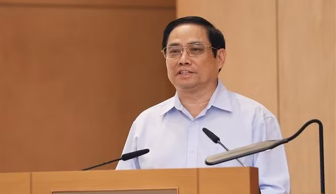 政府总理范明政：建设创新型、廉政型、行动型、高效型、服务型的第十五届政府 ảnh 1