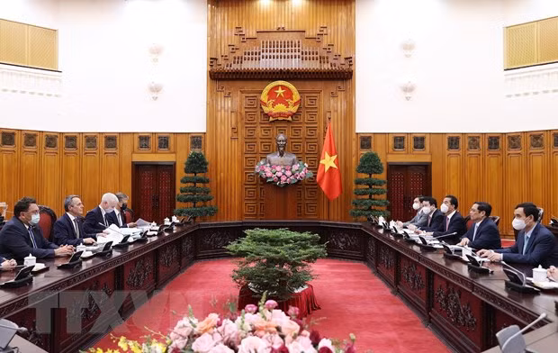 越南政府总理范明政会见瑞士联邦副总统兼外交部长卡西斯 ảnh 1
