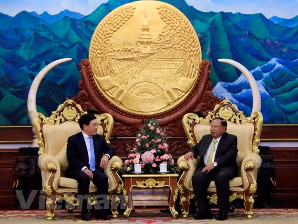 越南政府副总理兼外长范平明对老挝进行正式访问 ảnh 1 越南政府副总理兼外长范平明对老挝进行正式访问 ảnh 1