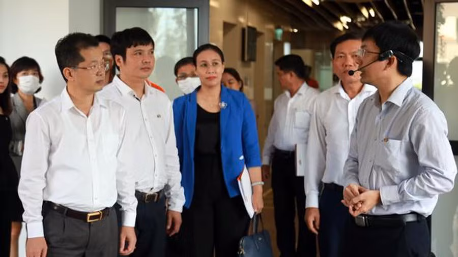 岘港市与FPT集团促进政府数字化转型的合作 ảnh 1
