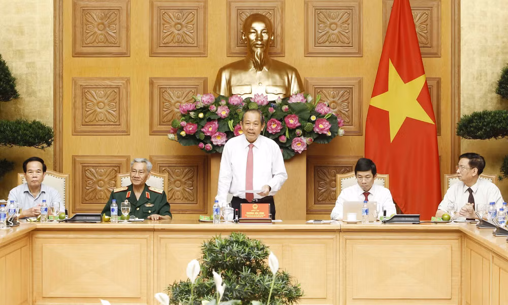 政府副总理张和平：英雄母亲和烈士家属的功劳是无法衡量的 ảnh 1