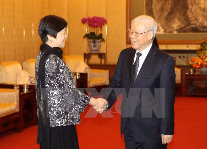 越共中央总书记阮富仲会见中国人民对外友好协会代表团 ảnh 2