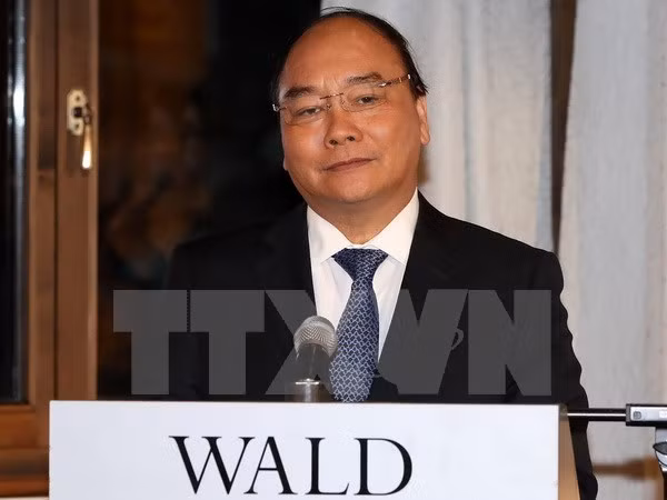 越南政府总理阮春福在达沃斯会见国际媒体记者 ảnh 1 越南政府总理阮春福在达沃斯会见国际媒体记者 ảnh 1