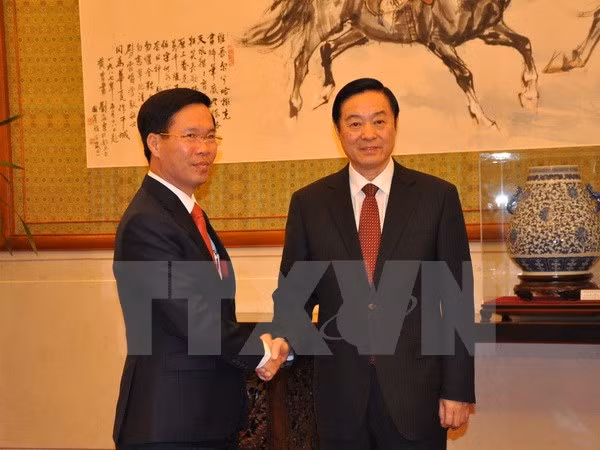 越共中央宣教部部长武文赏会见中共中央宣传部部长刘奇葆 ảnh 1